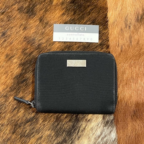 Gucci Handbags - Authentic Gucci Nylon and Leather Ziparound Wallet